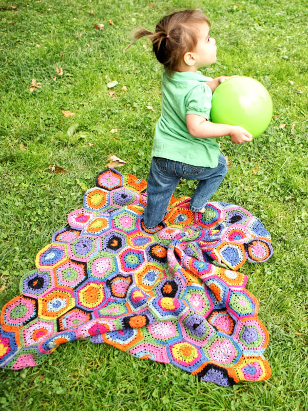 a child playing on the Wald blanket