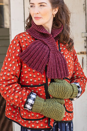 The Neala Mittens knit with Lanas Quick in the color Cordovan 77201