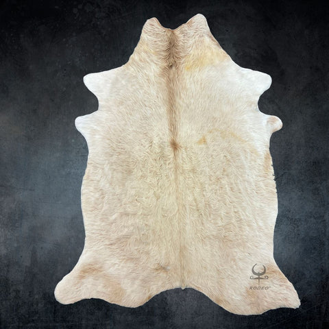 light beige cowhide rug