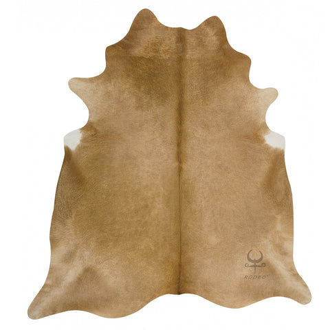 beige cowhide rug