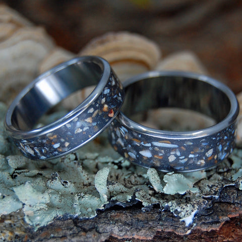 Crushed rocks and pebbles in a set of wedding rings