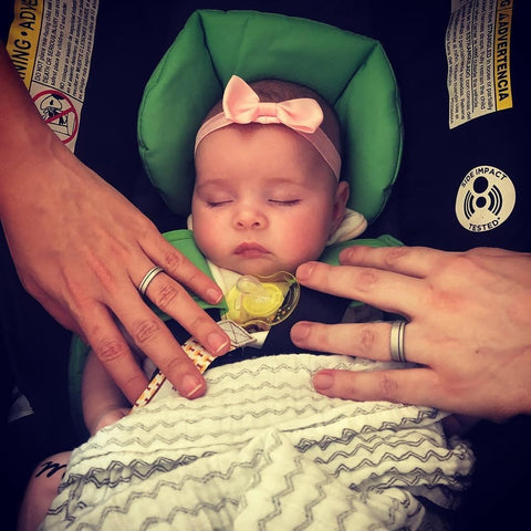 Minter + Richter Designs rings and a baby