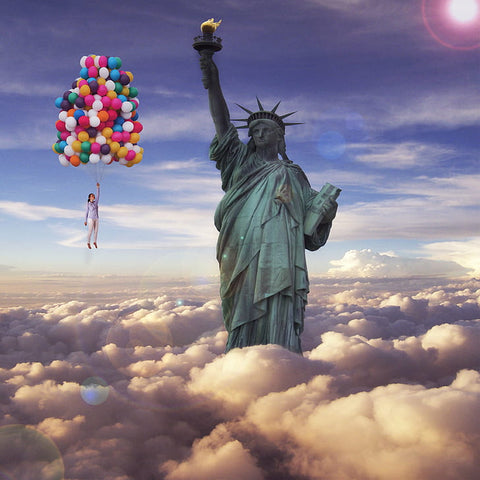 woman floating on balloons