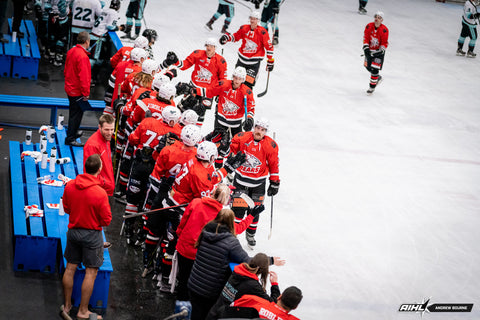 Sydney Bears' forward Timothy Newmark celebrates with the bench following his goal against the Central Coast Rhinos