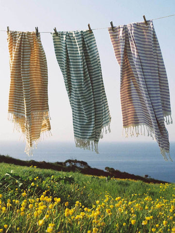 Striped hammam towels hanging on a washing line