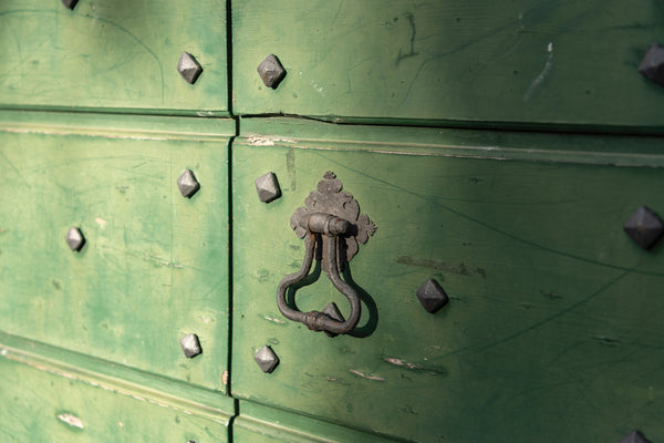 Studs on antique door Varenna lake Como