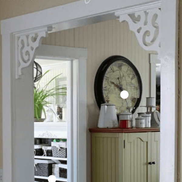 Shelf brackets as doorway feature