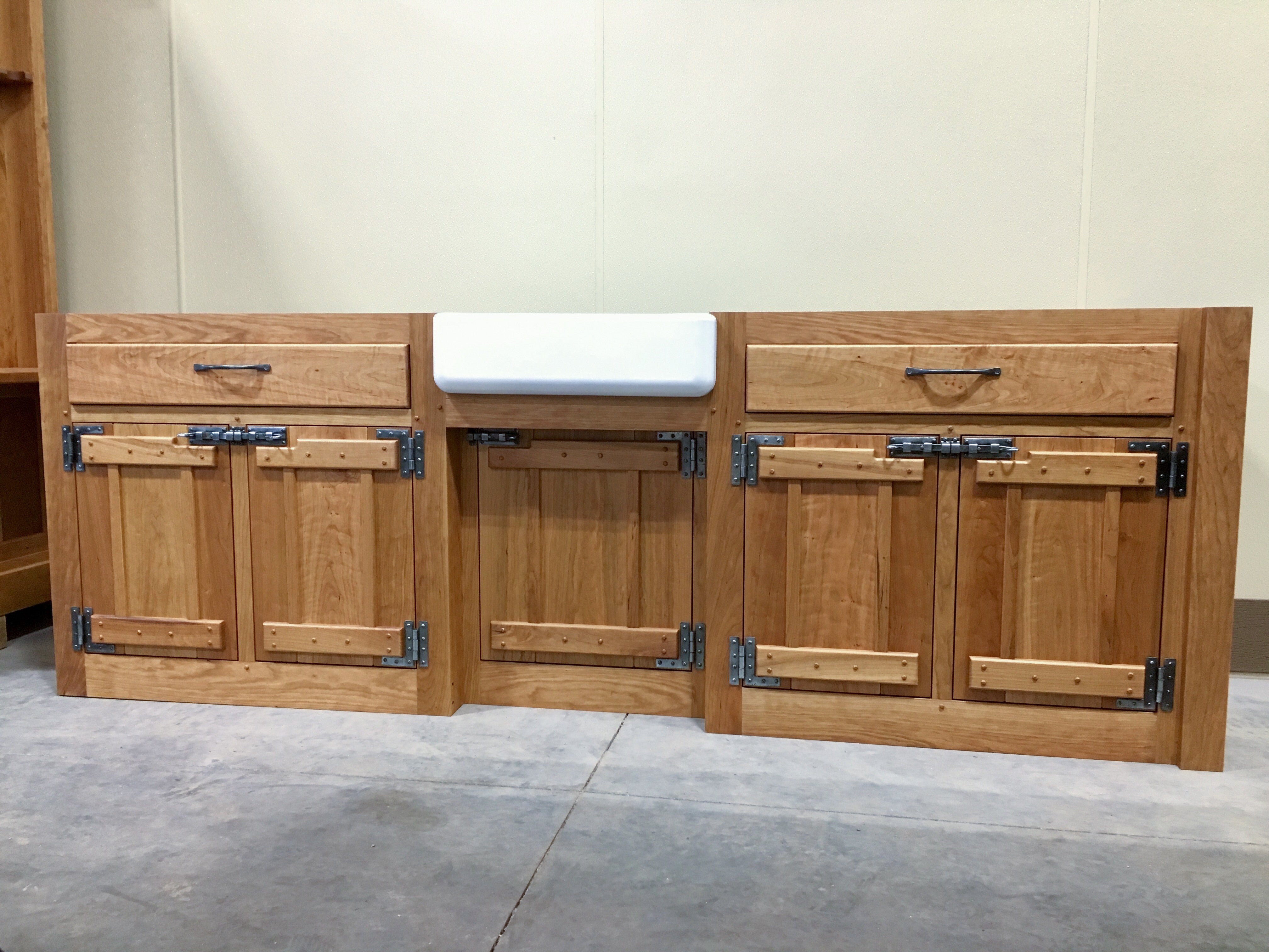 pewter pulls, hinges and bolts on kitchen cupboard