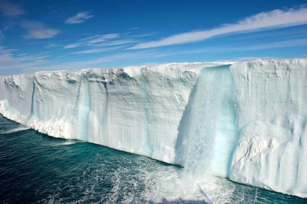 Melting ice waterfall in Svalbard, Norway