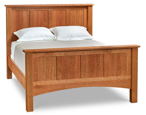 A standard bed, such as our Bethel Panel Bed, has a box spring under the mattress and sits up higher off of the floor.