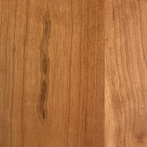 Mineral deposit in cherry table top