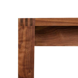 Finger joinery on corner of walnut Harbor Dining Table from Chilton Furniture in Maine