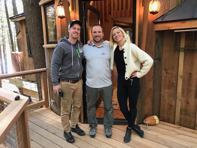 Chilton General Manager Nate Gobeil poses with Treehouse Masters Art Director Christina Salway and crew