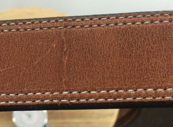 Natural scars are a sign of the real deal! True Full Grain Leather.