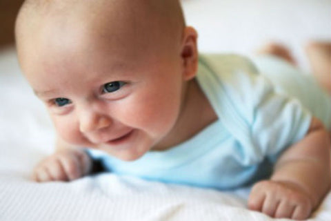 start tummy time earlier is better with encouragement using baby toys melaka