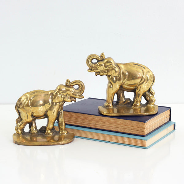 brass bookends marked with t