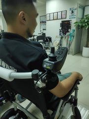 Electric wheelchair rear control