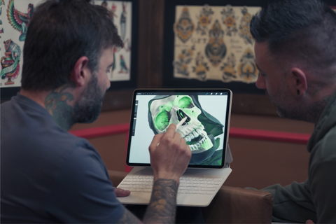 Artist working with Tattoo Smart tools on Procreate