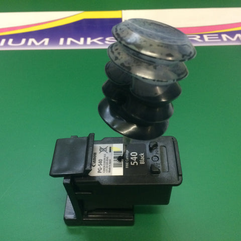 Inject ink into the PG-540BK Black ink cartridge by squeezing ink bottle.