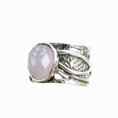 Sterling Silver ring with a faceted rose colored agate.