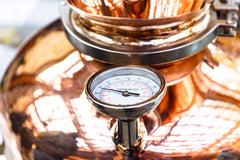 Thermometer on an alcohol still