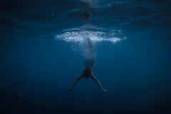 Woman swimming in deep Great Lakes waters