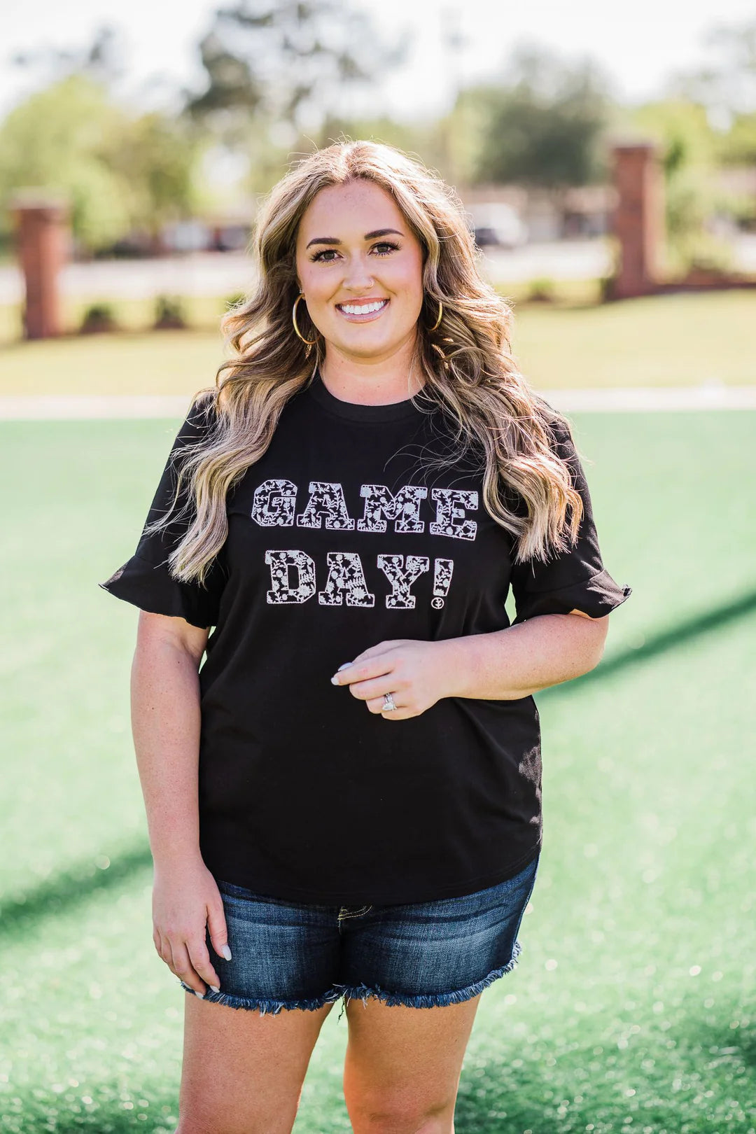 model wearing a game day tee shirt