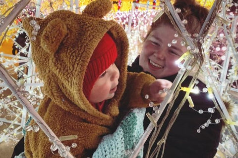 Manny and Mama Marveling at Lights