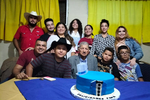 Maximo surrounded by 11 of his grandchildren and greatgrandchildren