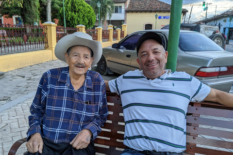 Maximo and Guillermo on park bench in Comayagua Plaza