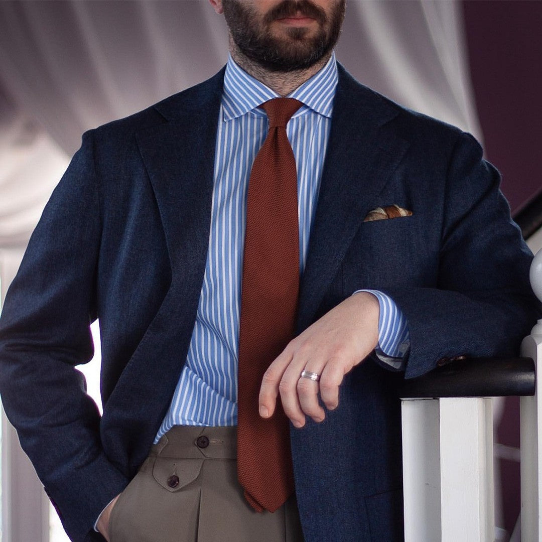 Aklasu Burnt Orange Tie Paired with Blue Suit