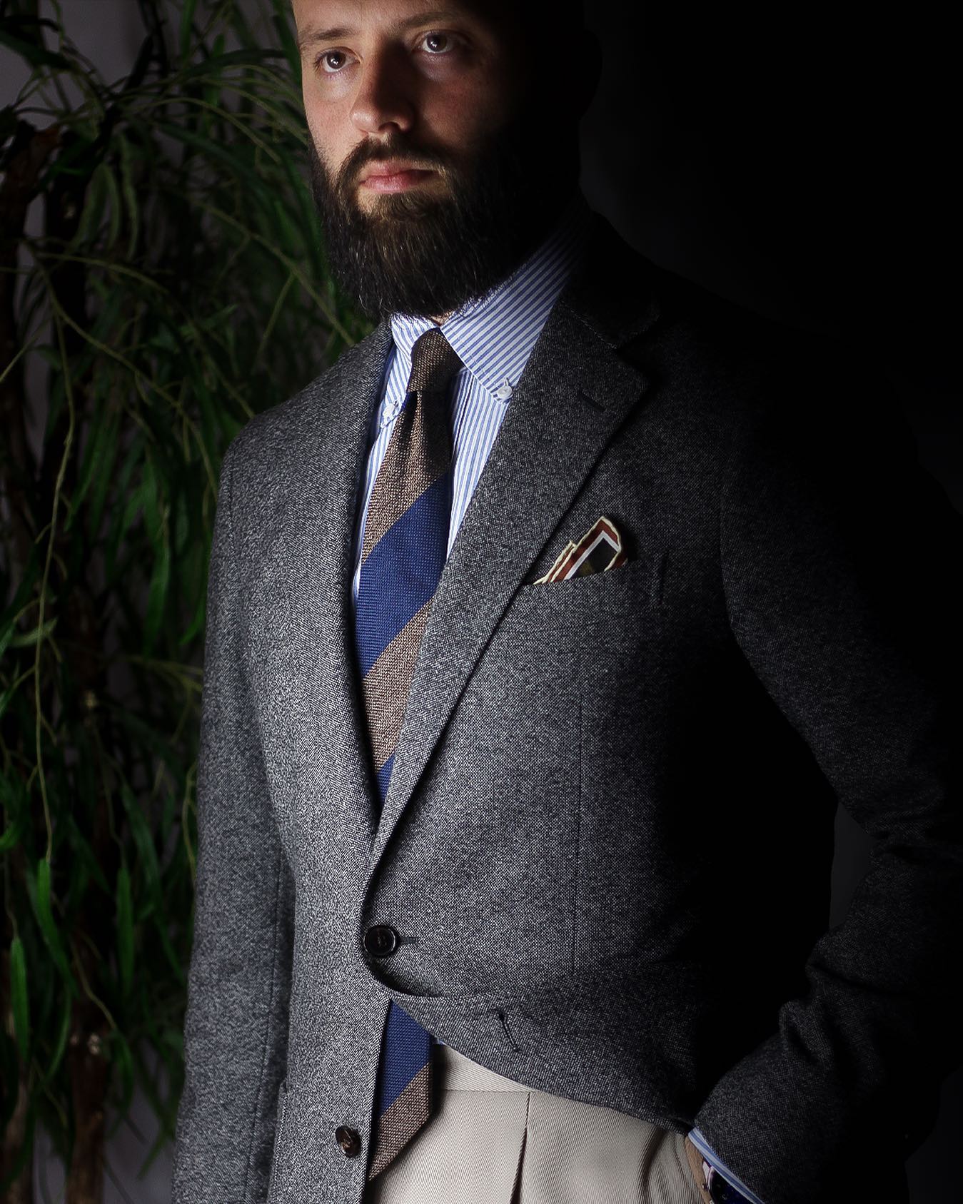 Light Brown and French Blue Block Striped Grenadine Tie paired with a grey suit