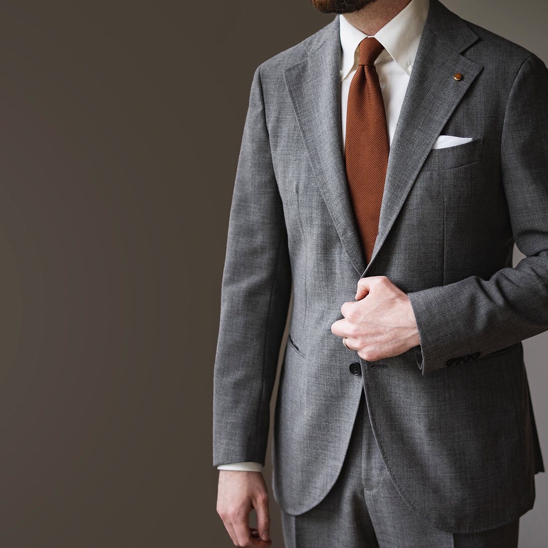 Burnt Orange Grenadine Tie with Grey Suit