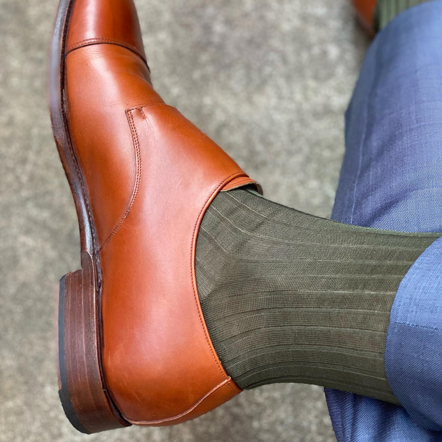 Olive Green dress socks paired with brown monks and blue trousers