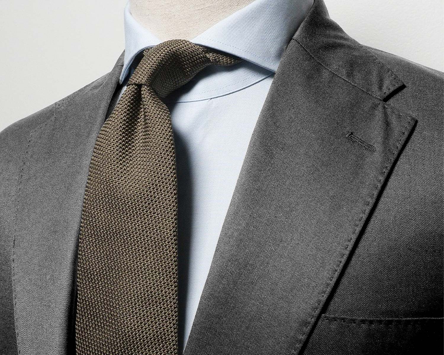 Refining Spring Suits for Men so You're in Full Bloom - Grey Suit with Olive Grenadine Tie