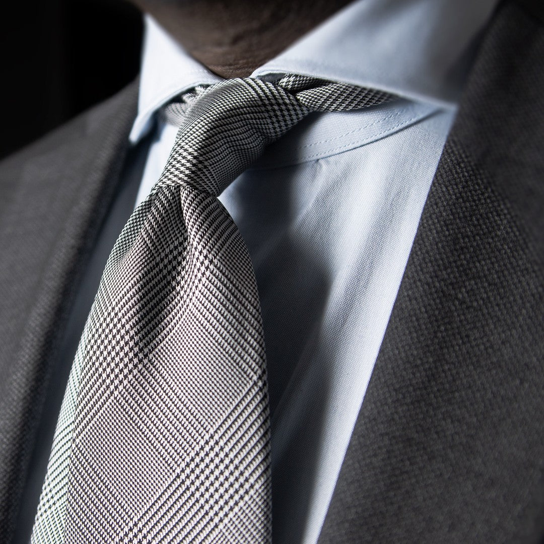 Glen Plaid Six-Fold Tie Paired with a Grey Suit