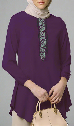 Woman wearing hijab with Suroor tunic in Dark purple with a purse.