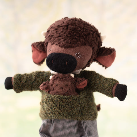 an inspired photo of rupert bison with his baby rupert bison dolly