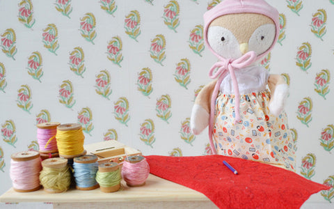 Lucy Owl with her materials to make embroidered Valentines
