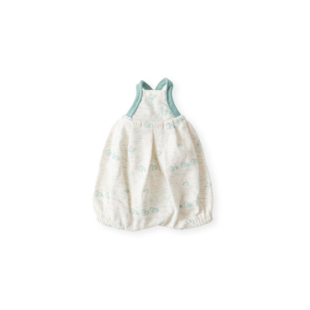 Product image on a white background of the lake beach swimsuit for dolls. This bubble-shaped suit features an original print of swimming ducklings and bobbing paper boats. Extremely cute, if we do say so ourselves! Made from ivory cotton jersey with elastic cuffs, velcro back closure, and a thoughtful tail hole. Light blue trim and cross-back straps match the swimsuit’s watery print.