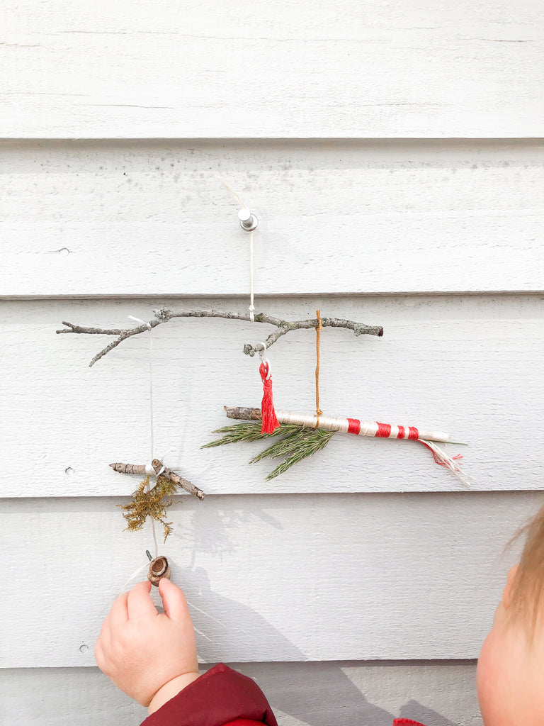 what a lovely wall hanging with a cute baby chub hand