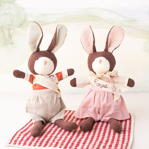 Zoe Rabbit and Lucas Rabbit wearing their Egg Day Bunny sashes