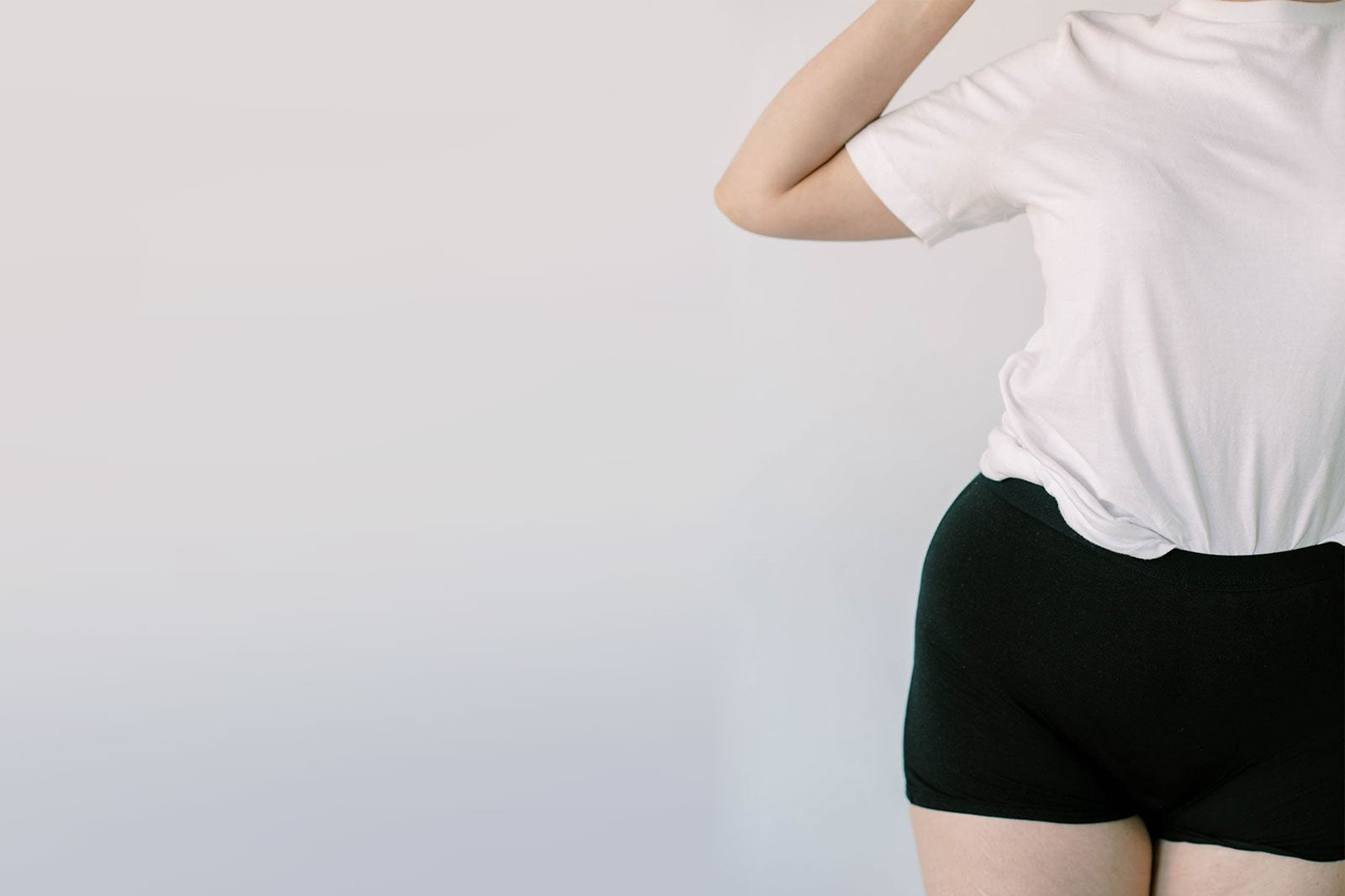 Close-up of illum’s leakproof undies worn by a woman