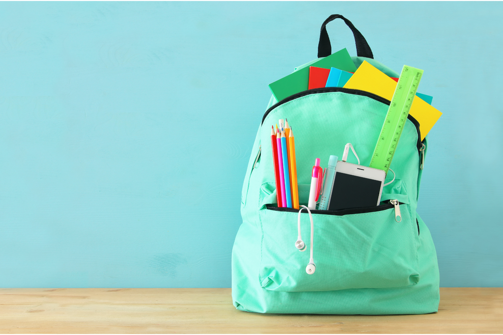 a backpack filled with back to school checklist items