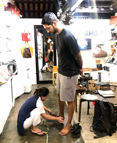 Alex Sinanan being measure for tall size