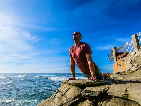 Brandon Booth does tall guy yoga in mens tall clothing by Navas Lab Apparel