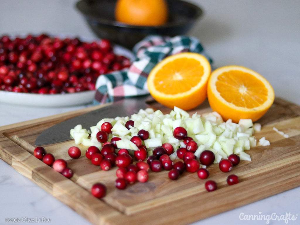 Christmas Jam Canning Recipe with apples, cranberries, orange citrus fruit | CanningCrafts.com