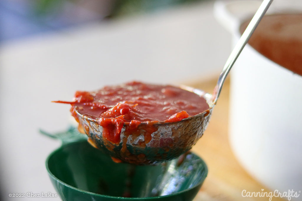 Ladle Filled with Tomato Jam with Red Wine Vinegar | CanningCrafts.com