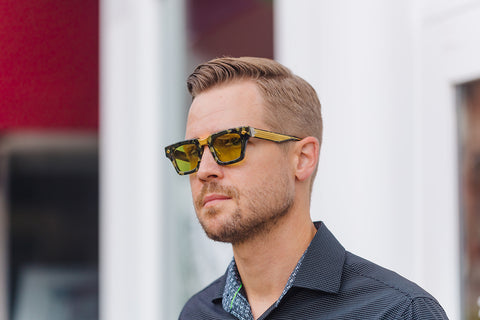 Man wearing T Henri Corsa sunglasses in color camolux 