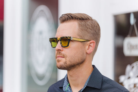 Man wearing T Henri Corsa sunglasses in color camolux 